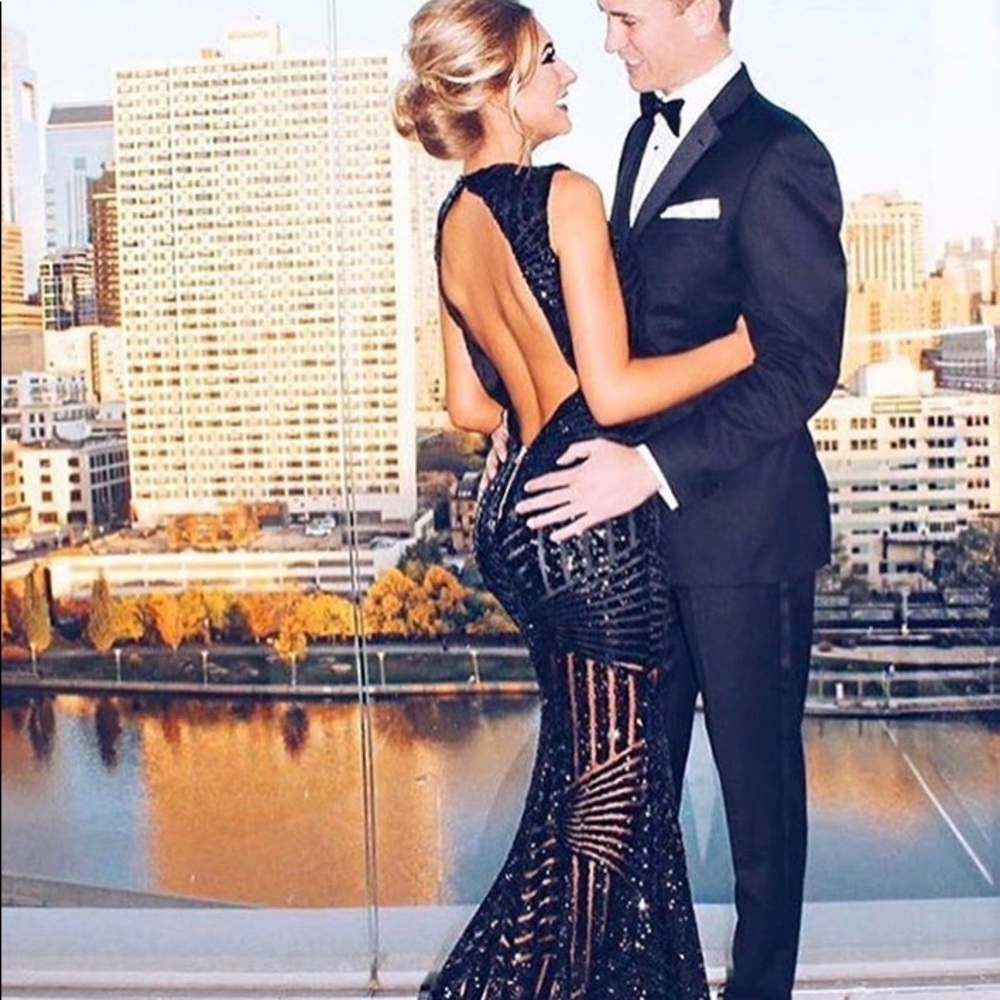 Black sequin evening gown.